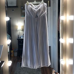 White with blue pin stripes jump suit